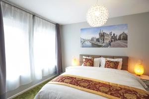 Letto o letti in una camera di Hotel Temse
