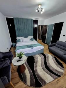 Postel nebo postele na pokoji v ubytování Cabana La Conac