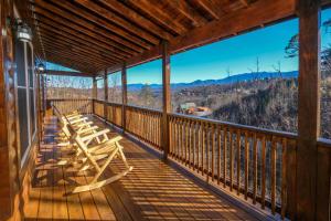 a porch with a view of the mountains at Chestnut Tower in Gatlinburg