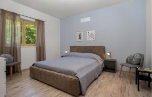 Ένα ή περισσότερα κρεβάτια σε δωμάτιο στο Villa Soffio Daria
