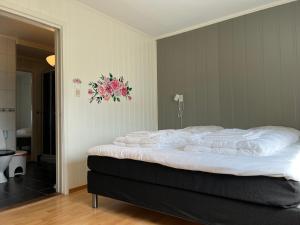 Lova arba lovos apgyvendinimo įstaigoje Guest House -Apartment