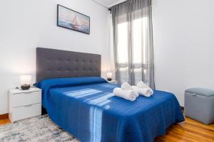 Katil atau katil-katil dalam bilik di Apartamento Ideal para Familias +8 gambar