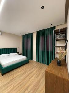 ヴロラにあるOlivium Roomsのギャラリーの写真