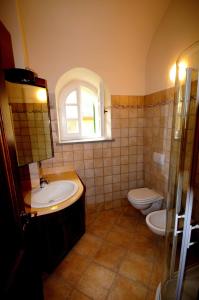 Ένα μπάνιο στο Relais Villa Sensano