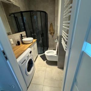 Ένα μπάνιο στο Cosy Studio Lubelska SkyRes City Center Free Parking Panoramic View