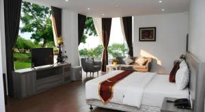 Postel nebo postele na pokoji v ubytování Soo Hotel Bac Ninh