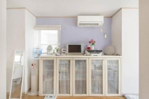 Et tv og/eller underholdning på Yoyogi Detached house Y4BD