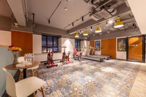 Posezení v ubytování Happy Inn-Xinzheng International Airport Branch喜鹊愉家连锁酒店-机场店