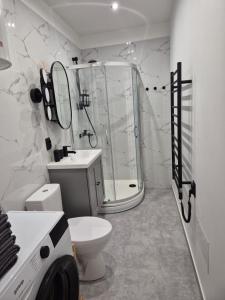 Ένα μπάνιο στο Klints 9 Rent Apartments - Stay in Liepāja
