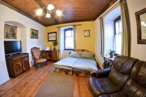 Μια τηλεόραση ή/και κέντρο ψυχαγωγίας στο Antik Apartmán Levoča +7 φωτογραφίες