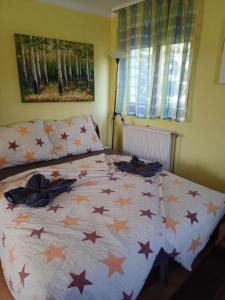 Postel nebo postele na pokoji v ubytování Czanadomb apartman