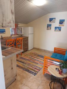 Η κουζίνα ή μικρή κουζίνα στο Malto's Little Cottage