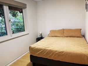 Postel nebo postele na pokoji v ubytování Precioso Departamento en Isla Teja Para 4 Personas con Estacionamiento Privado