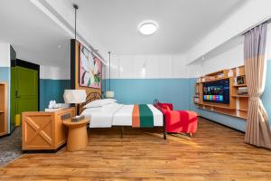 Postel nebo postele na pokoji v ubytování Happy Inn-Xinzheng International Airport Branch喜鹊愉家连锁酒店-机场店