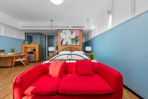 Postel nebo postele na pokoji v ubytování Happy Inn-Xinzheng International Airport Branch喜鹊愉家连锁酒店-机场店