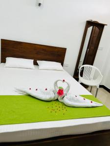 Jaffna City Palace Hotel客房内的一张或多张床位