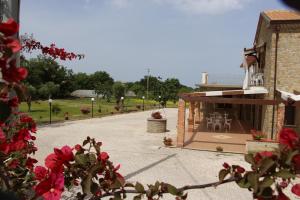 Κήπος έξω από το Country House Il Melograno