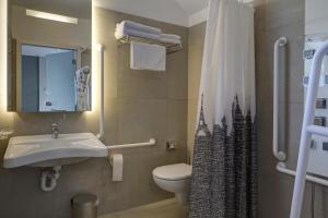 Ένα μπάνιο στο Hotel Liberty Self Check-In