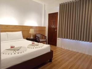 Voodi või voodid majutusasutuse Zosimo's Inn toas