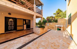 an outside view of a house with a patio at Beautiful Home In Vela Luka in Vela Luka +39 photos