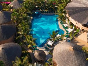 Bazén v ubytování Movenpick Resort Lamantin Saly nebo v jeho okolí