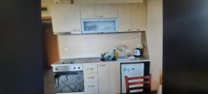 Η κουζίνα ή μικρή κουζίνα στο Аспен голф ризорт F204 +4 φωτογραφίες