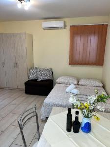 Postel nebo postele na pokoji v ubytování Apartments Frakić