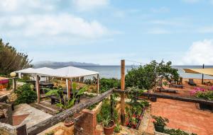 a patio with a view of the ocean at Amazing Apartment In Trappeto With Wifi in Trappeto