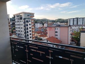 a view of a city from a balcony at Damass Apartman in Novi Pazar