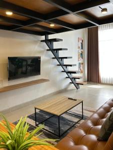 Μια τηλεόραση ή/και κέντρο ψυχαγωγίας στο De Kamar Mezzanine