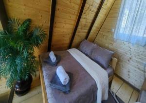 Postel nebo postele na pokoji v ubytování Biserni Kutak