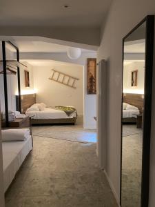 Postel nebo postele na pokoji v ubytování Maison Poluc Boutique Hotel + 50 fotografií