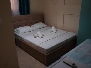 Postel nebo postele na pokoji v ubytování OKEJ Hotel
