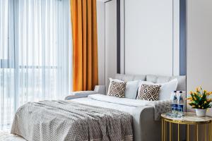 Ένα ή περισσότερα κρεβάτια σε δωμάτιο στο Sky Flat