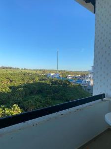 a view of a field from a balcony at Marina Golf Asilah in Asilah
