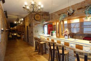 Um restaurante ou outro lugar para comer em Hotel Zámeček