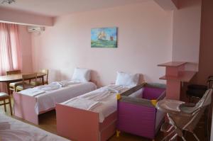 Postel nebo postele na pokoji v ubytování Complex Exotica