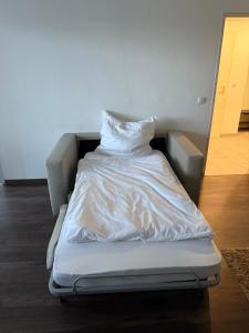 Ένα ή περισσότερα κρεβάτια σε δωμάτιο στο Wohlfühlen nahe Köln-Messe