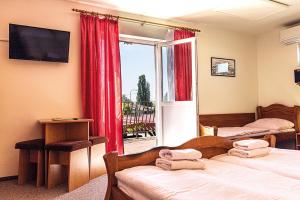 Cama ou camas em um quarto em Hotel Zámeček