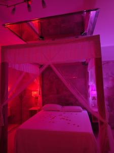 A bed or beds in a room at Confort Suites