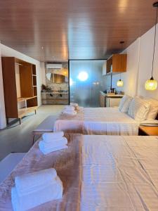 Postel nebo postele na pokoji v ubytování Atins Beach Studios - Charmoso e Aconchegante