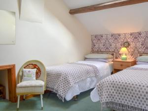 Ένα ή περισσότερα κρεβάτια σε δωμάτιο στο Stonefold Cottage +5 φωτογραφίες