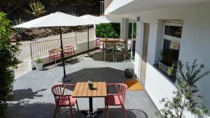 En balkon eller terrasse på Sobremesa Boutique