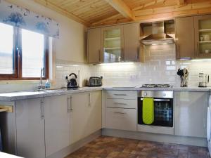 Kuchyň nebo kuchyňský kout v ubytování Callow Lodge