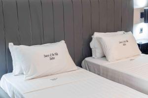 Letto o letti in una camera di Mirembe Hotels - Source of the Nile Suites