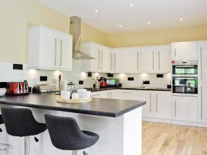 Kuchyň nebo kuchyňský kout v ubytování Corrie Massan