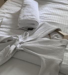 Postel nebo postele na pokoji v ubytování სასტუმრო ამელი/Hotel Ameli
