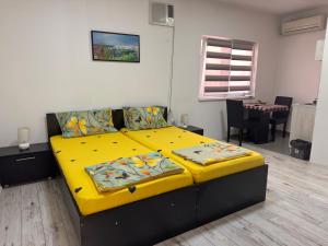 Voodi või voodid majutusasutuse Mitić Apartmani 1 toas