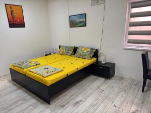 Voodi või voodid majutusasutuse Mitić Apartmani 1 toas