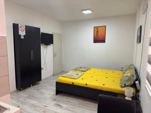 Voodi või voodid majutusasutuse Mitić Apartmani 1 toas